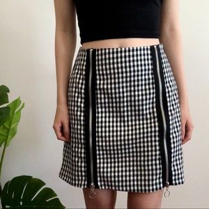 Black/white plaid skirt from The Ragged Priest